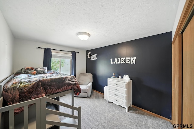 2303 N 150th Ave, Omaha, NE 68116 - bedroom featuring carpet flooring and a textured ceiling