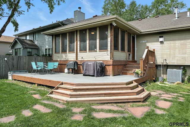 2303 N 150th Ave, Omaha, NE 68116 - back of property featuring a sunroom, a chimney, roof with shingles, and a deck