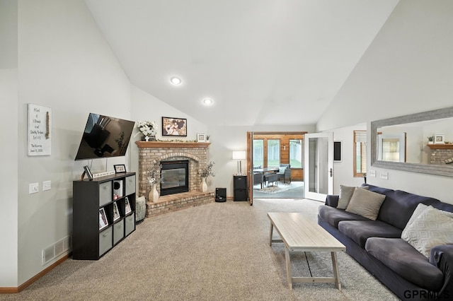 2303 N 150th Ave, Omaha, NE 68116 - living room featuring high vaulted ceiling, carpet flooring, a brick fireplace, and recessed lighting