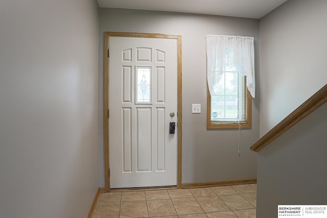 32 Huron Cir, Council Bluffs, IA 51501 - foyer entrance featuring baseboards and light tile patterned floors
