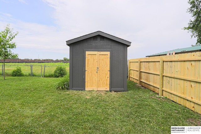 32 Huron Cir, Council Bluffs, IA 51501 - view of shed featuring a fenced backyard