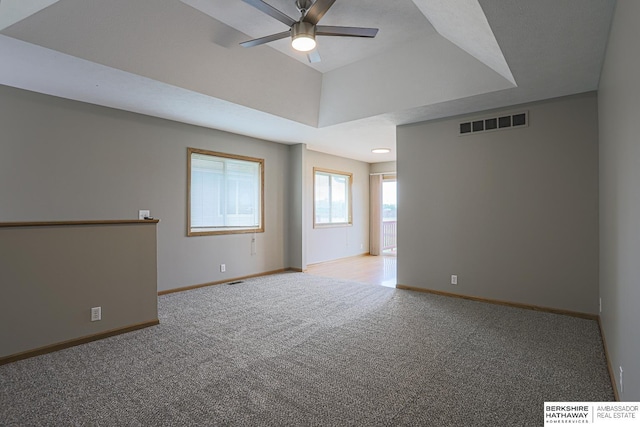 32 Huron Cir, Council Bluffs, IA 51501 - unfurnished room featuring light carpet and ceiling fan