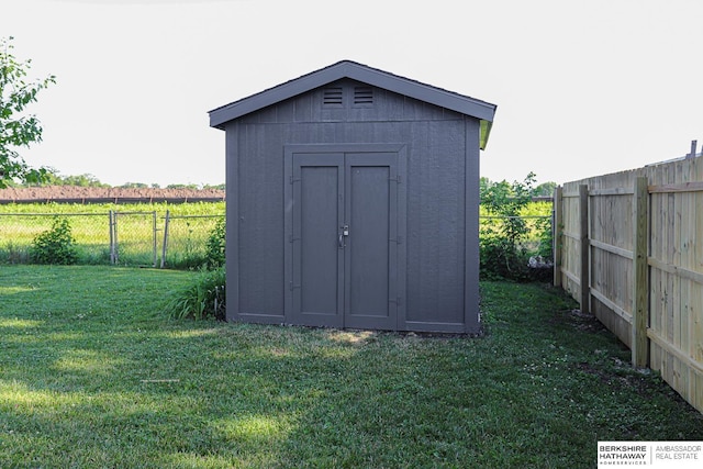 32 Huron Cir, Council Bluffs, IA 51501 - view of shed featuring a fenced backyard