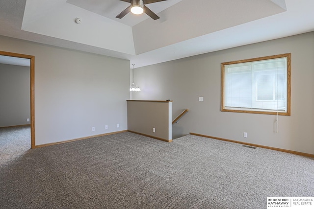 32 Huron Cir, Council Bluffs, IA 51501 - carpeted spare room featuring a ceiling fan, a smoke detector, and a raised ceiling