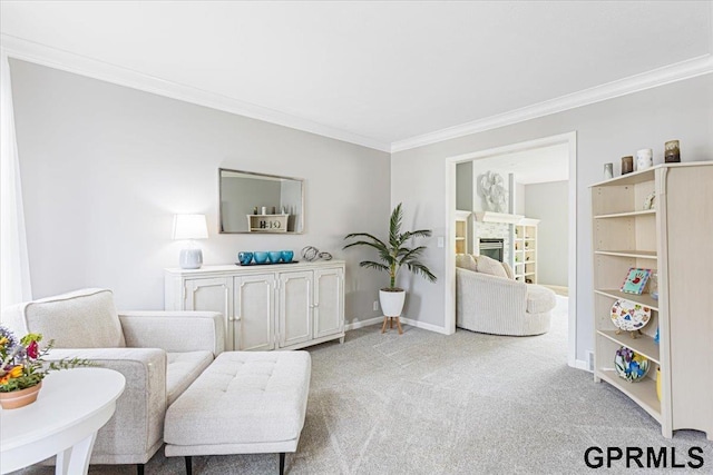 16404 Polk St, Omaha, NE 68135 - sitting room featuring ornamental molding, carpet, and a glass covered fireplace