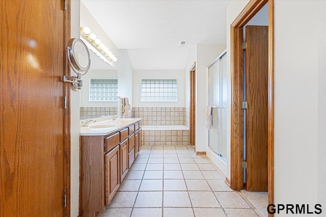 16404 Polk St, Omaha, NE 68135 - full bath with a bath, double vanity, a shower stall, and tile patterned flooring