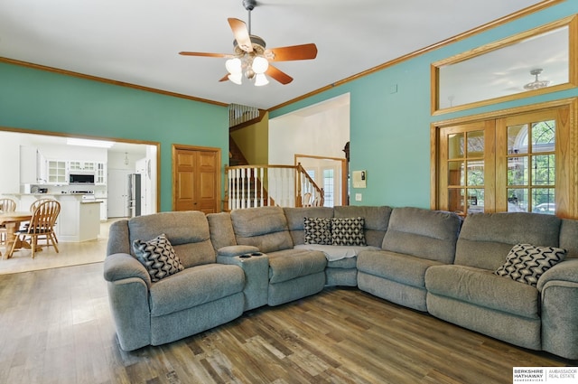1326 Bellevue Blvd, Bellevue, NE 68005 - living room with crown molding, ceiling fan, wood finished floors, and stairs