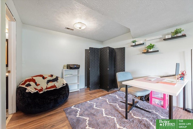 10011 S 9th Cir, Bellevue, NE 68123 - home office with wood finished floors and a textured ceiling
