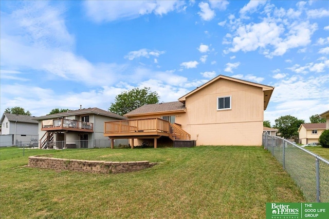 10011 S 9th Cir, Bellevue, NE 68123 - rear view of house with a fenced backyard, a deck, and stairs