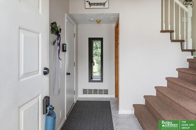 10011 S 9th Cir, Bellevue, NE 68123 - foyer entrance featuring stairs and light marble finish floors