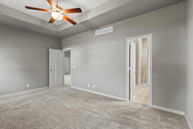 12040 S 44th St, Bellevue, NE 68123 - unfurnished bedroom featuring carpet floors, ensuite bathroom, and a ceiling fan