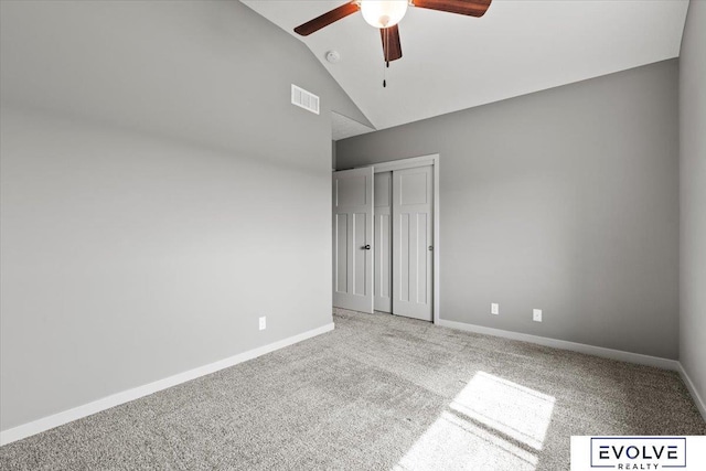 12040 S 44th St, Bellevue, NE 68123 - unfurnished bedroom with lofted ceiling, carpet floors, a closet, and a ceiling fan