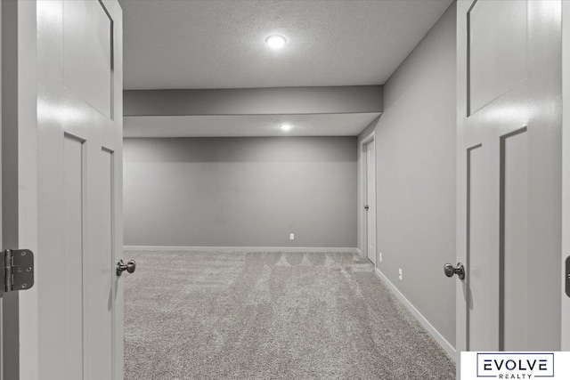 12040 S 44th St, Bellevue, NE 68123 - basement with carpet, a textured ceiling, and recessed lighting