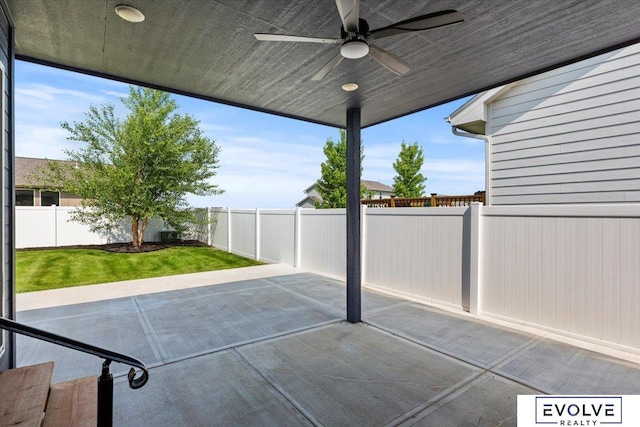 12040 S 44th St, Bellevue, NE 68123 - fenced backyard featuring ceiling fan and a patio area