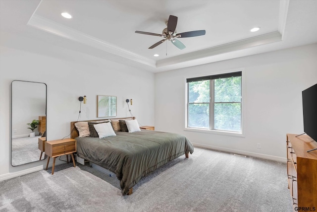 2111 Gindy Dr, Bellevue, NE 68147 - carpeted bedroom with a tray ceiling, recessed lighting, ornamental molding, and a ceiling fan