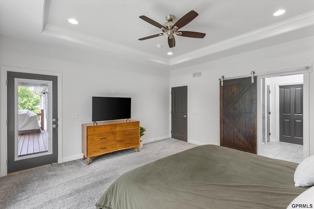 2111 Gindy Dr, Bellevue, NE 68147 - bedroom with a raised ceiling, a barn door, recessed lighting, light carpet, and crown molding