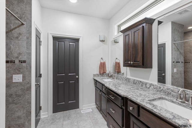 2111 Gindy Dr, Bellevue, NE 68147 - full bath with double vanity and tiled shower
