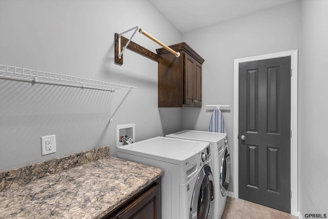2111 Gindy Dr, Bellevue, NE 68147 - laundry room featuring cabinet space and independent washer and dryer