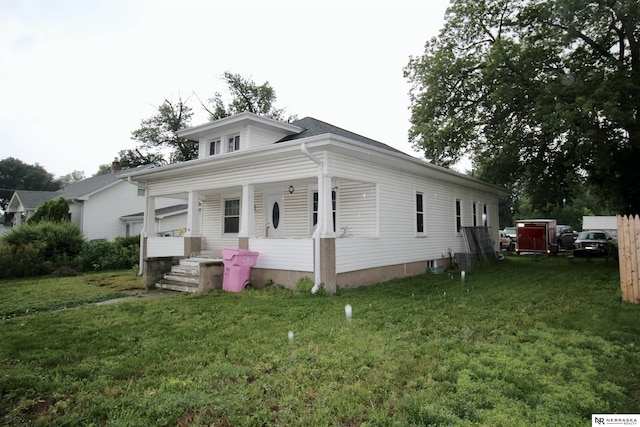 315 N Main St, Wilber, NE 68465 - view of front facade with covered porch and a front lawn