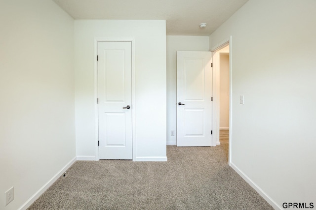 2507 Murray Rd, Plattsmouth, NE 68048 - unfurnished bedroom featuring carpet floors and baseboards