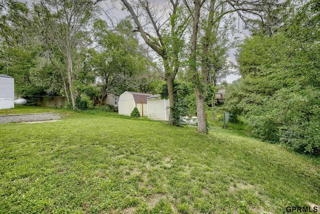 2507 Murray Rd, Plattsmouth, NE 68048 - view of grassy yard with a storage shed