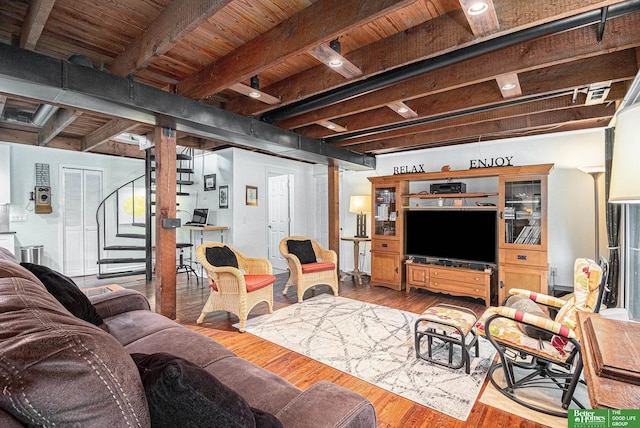 9109 Murray Dr, Plattsmouth, NE 68048 - living room featuring wood finished floors, stairway, and a wooden ceiling with exposed beams