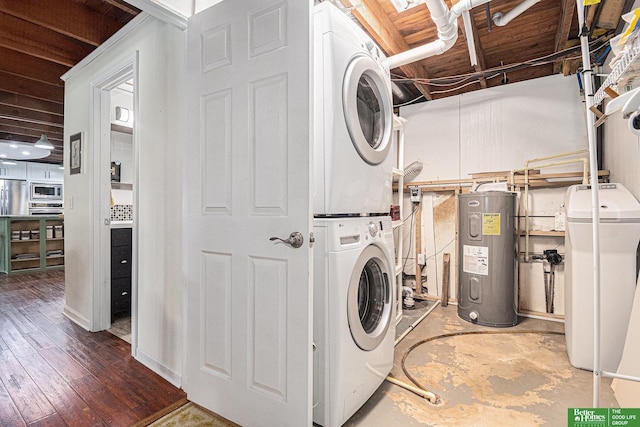 9109 Murray Dr, Plattsmouth, NE 68048 - laundry area with electric water heater, estacked washer and dryer, and hardwood / wood-style flooring