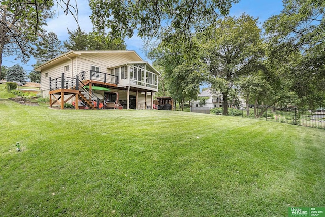 9109 Murray Dr, Plattsmouth, NE 68048 - rear view of house featuring stairs, a sunroom, and a wooden deck