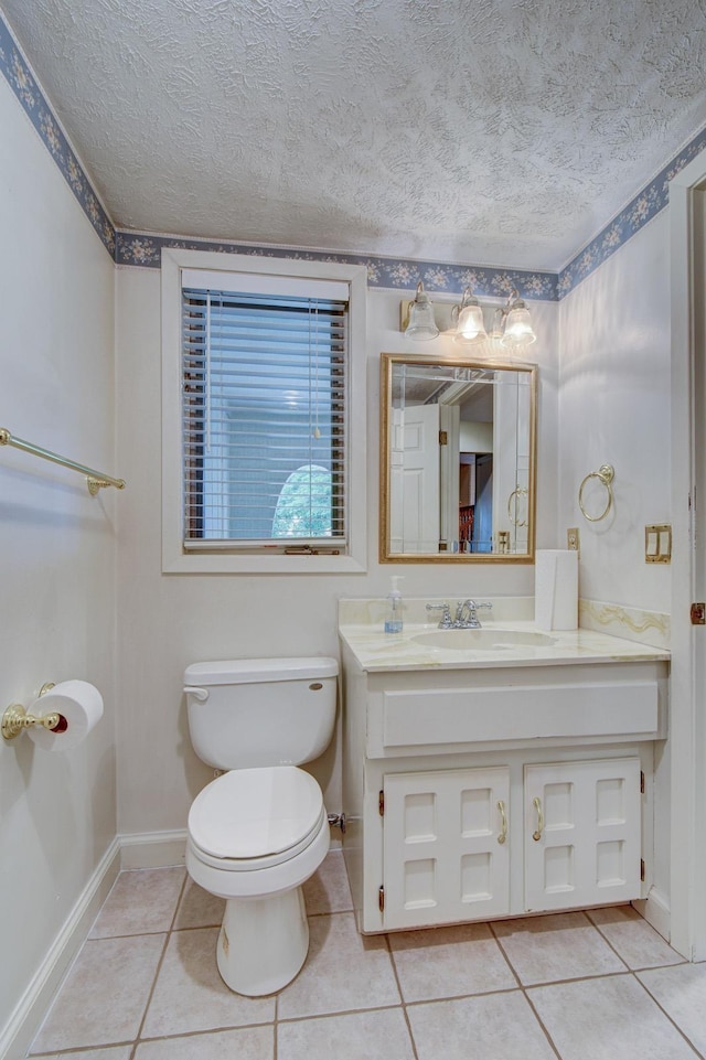 2530 S 148th St, Omaha, NE 68144 - bathroom featuring tile patterned floors, vanity, and a textured ceiling