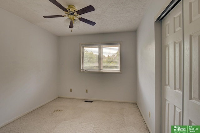2530 S 148th St, Omaha, NE 68144 - carpeted spare room with a textured ceiling and ceiling fan