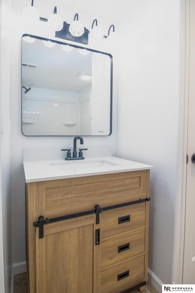 3772 F St, Lincoln, NE 68510 - bathroom featuring vanity and baseboards