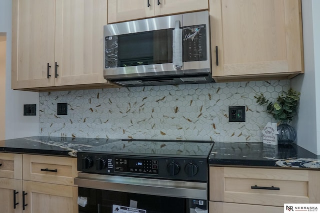 3772 F St, Lincoln, NE 68510 - kitchen featuring appliances with stainless steel finishes, tasteful backsplash, and light brown cabinetry