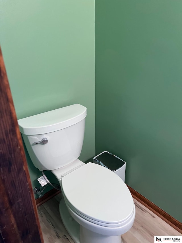 6211 S 150th St, Omaha, NE 68137 - bathroom featuring toilet and wood finished floors