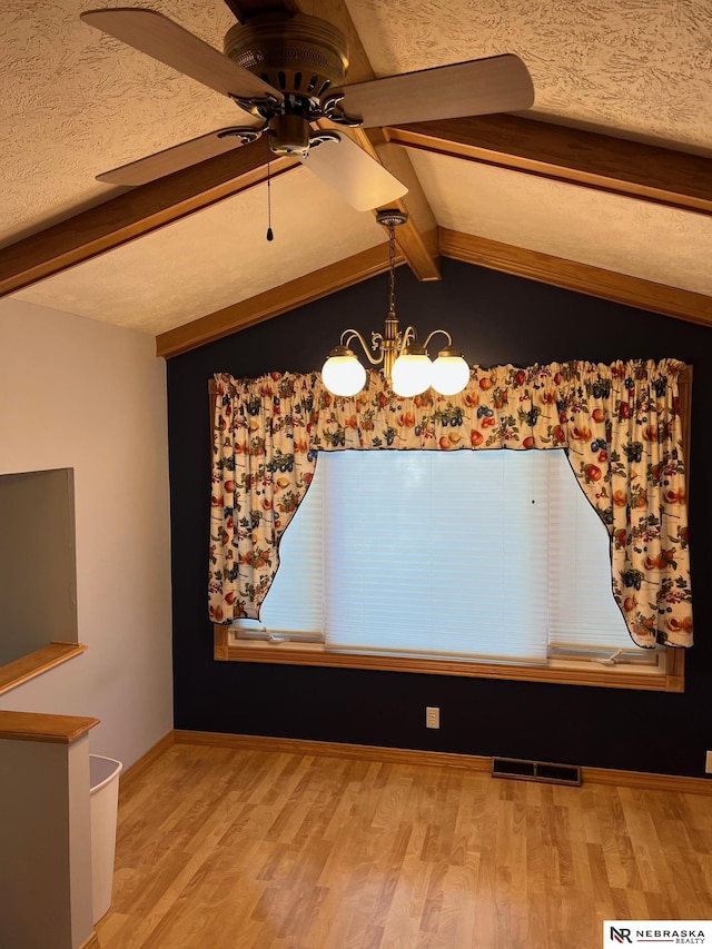 6211 S 150th St, Omaha, NE 68137 - unfurnished dining area with ceiling fan, wood finished floors, and a chandelier