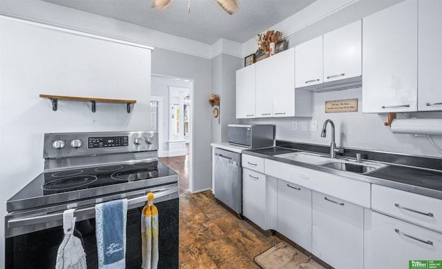 13130 N St N, Omaha, NE 68137 - kitchen featuring stainless steel appliances, white cabinetry, and ceiling fan