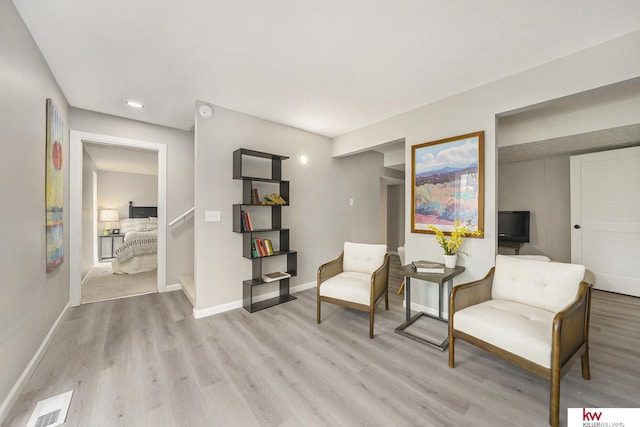 11339 Old Maple Rd, Omaha, NE 68164 - sitting room featuring light wood-style floors and recessed lighting