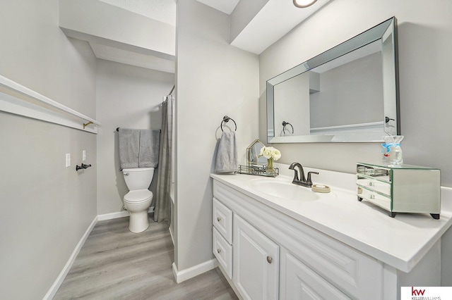 11339 Old Maple Rd, Omaha, NE 68164 - bathroom featuring vanity, wood finished floors, and a shower with curtain