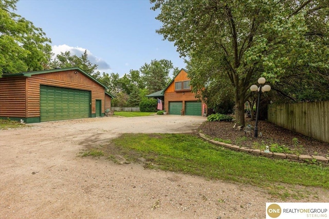 3521 N 267th Plz, Waterloo, NE 68069 - detached garage featuring dirt driveway