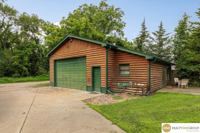 3521 N 267th Plz, Waterloo, NE 68069 - garage featuring driveway