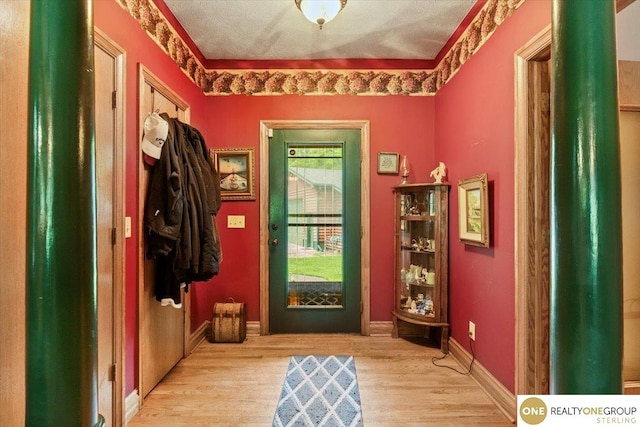 3521 N 267th Plz, Waterloo, NE 68069 - entrance foyer with light wood finished floors and baseboards