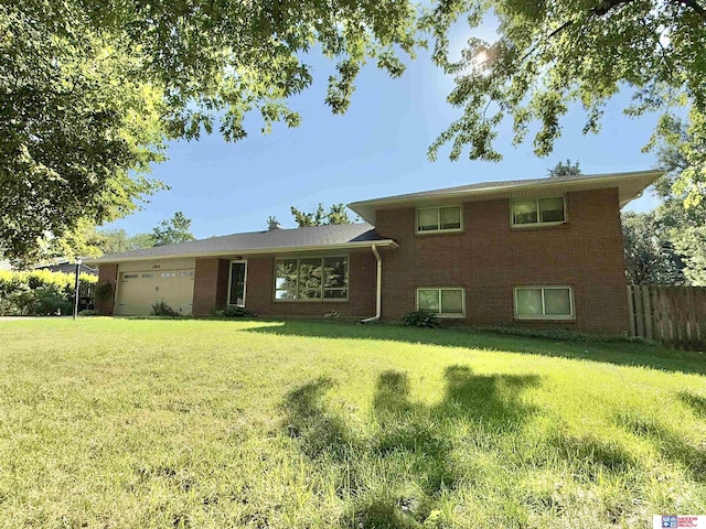 1254 N 8th St, Seward, NE 68434 - view of front of home featuring a garage and brick siding