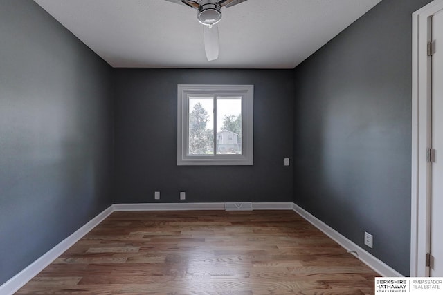 2726 N 129th Cir, Omaha, NE 68164 - unfurnished room with wood finished floors and baseboards