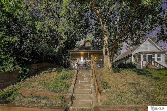 4419 N 39th St, Omaha, NE 68111 - view of front of house with stairs and a porch
