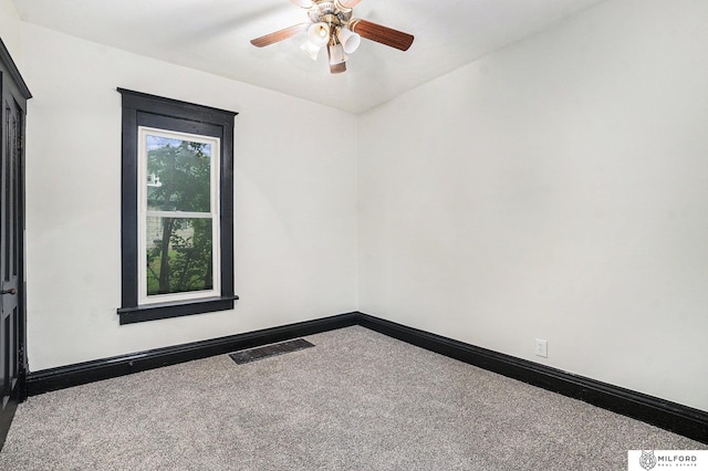 4419 N 39th St, Omaha, NE 68111 - spare room featuring carpet and a ceiling fan