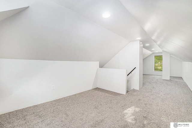4419 N 39th St, Omaha, NE 68111 - additional living space with vaulted ceiling, recessed lighting, and carpet floors