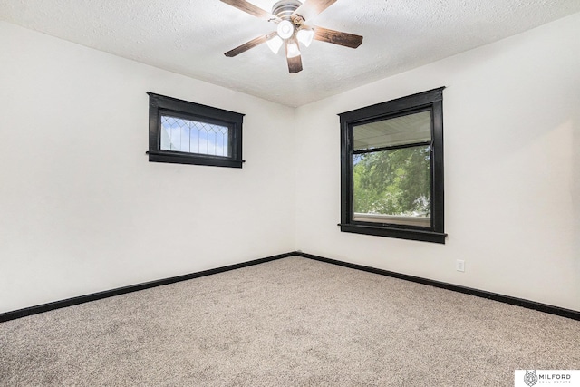 4419 N 39th St, Omaha, NE 68111 - carpeted spare room with ceiling fan and a textured ceiling