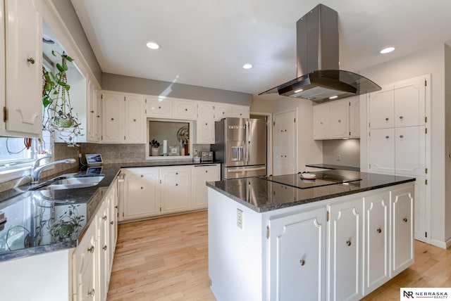 1373 S 137th Ave, Omaha, NE 68144 - kitchen with island exhaust hood, stainless steel fridge, light wood-style flooring, white cabinetry, and recessed lighting