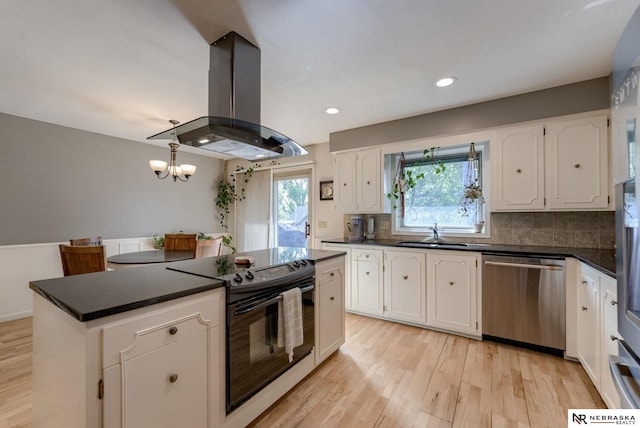 1373 S 137th Ave, Omaha, NE 68144 - kitchen featuring stainless steel dishwasher, black / electric stove, island range hood, dark countertops, and white cabinets