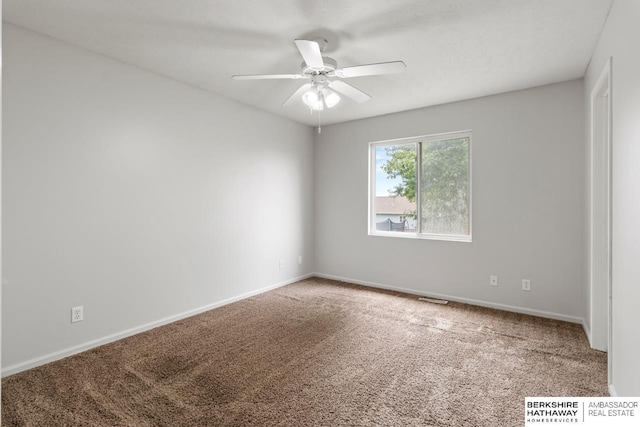 17737 Edna St, Omaha, NE 68136 - spare room featuring carpet floors and a ceiling fan