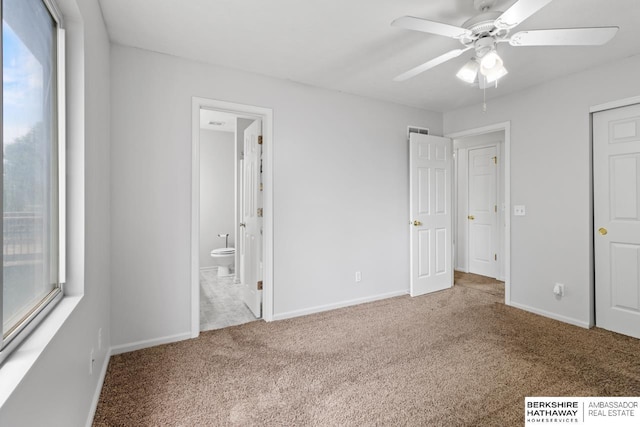 17737 Edna St, Omaha, NE 68136 - unfurnished bedroom with carpet flooring, ensuite bath, and a ceiling fan
